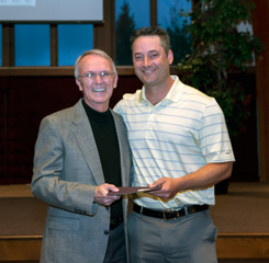 Dr. Attig presenting the inaugural scholarship to Nathan Blanchard