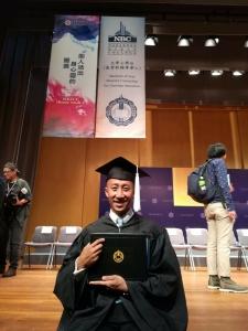 Wai Lun Alan Tau is pictured here with his diploma.
