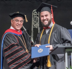 President Graves Presenting a Diploma