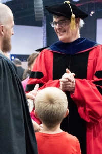 Dr. King Greeting 2019 Graduate and Family