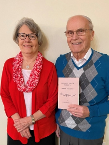 Harold and Virginia Harness with his Book