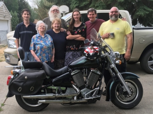 Pastor Richard Evans, second to the right, next to his daughter